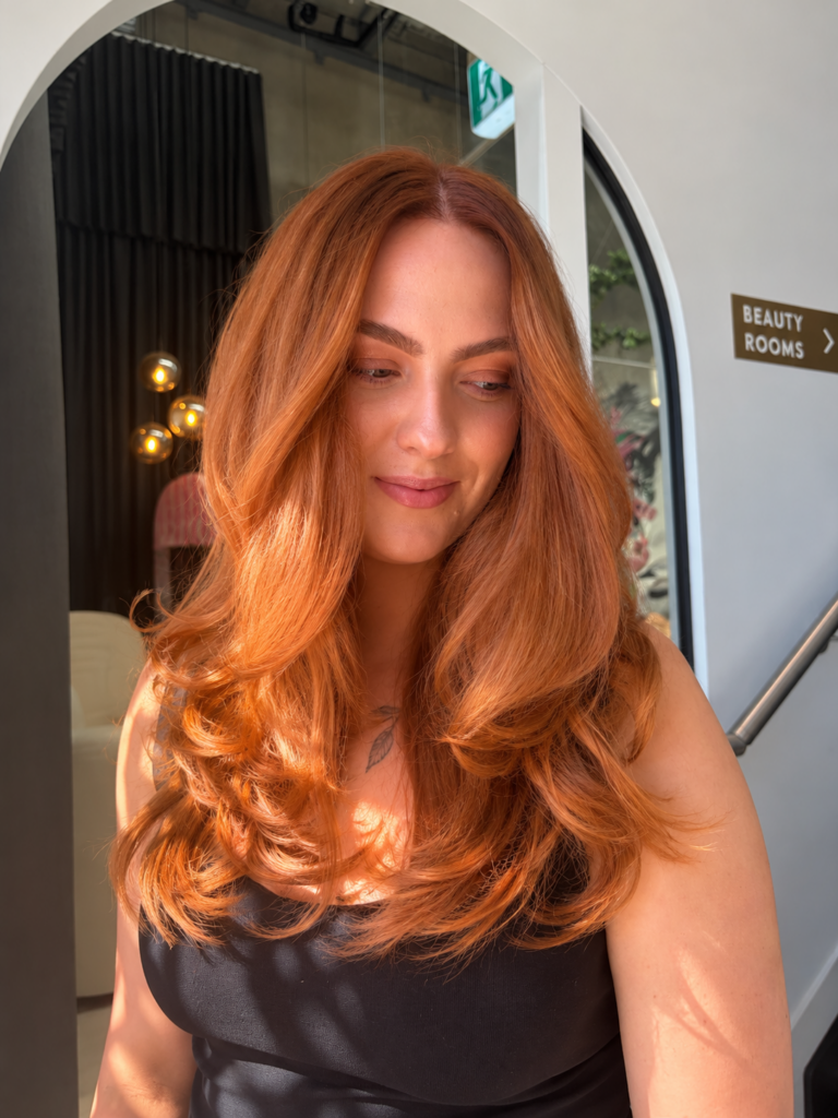 Long copper waves after a colour and extensions service